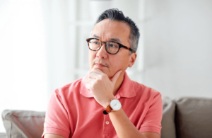 older man thinking about grief and his experience with a Simi Valley therapist